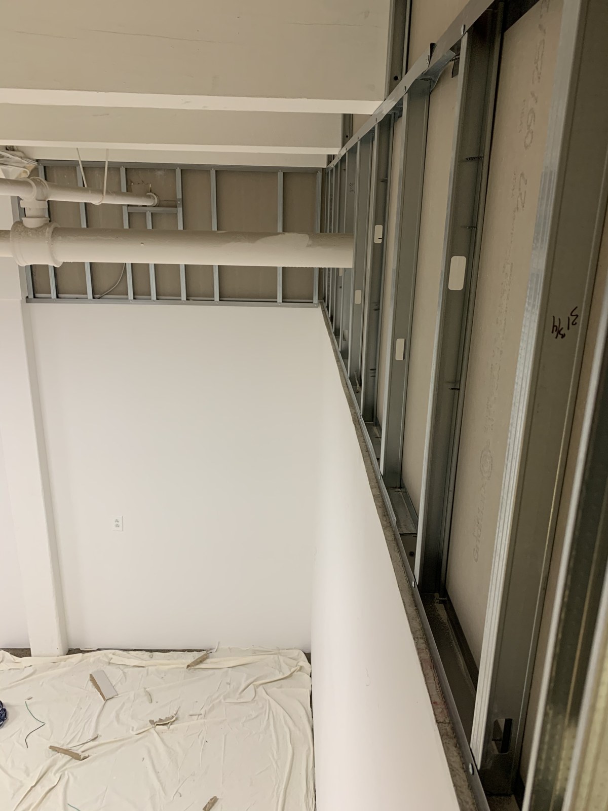 Drywall partitions during interior construction