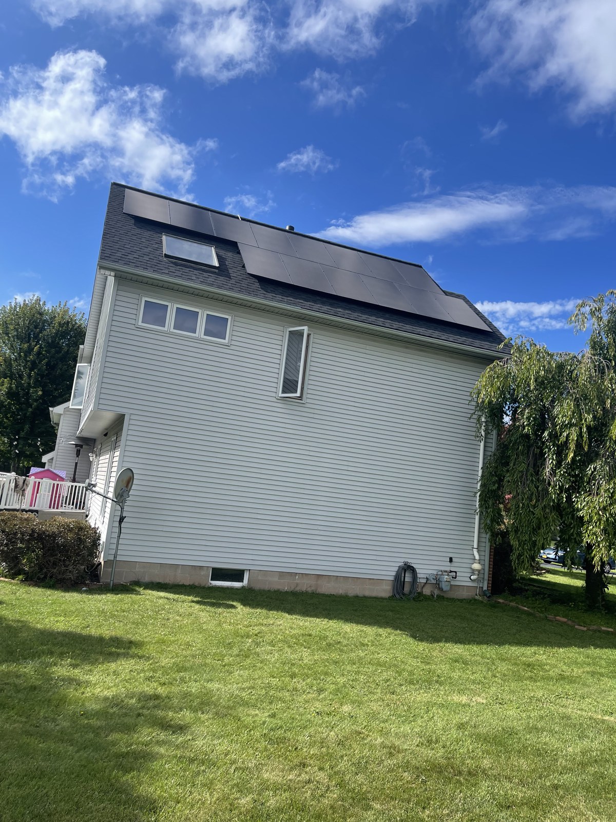 Solar panels installed on a residential shingle roof
